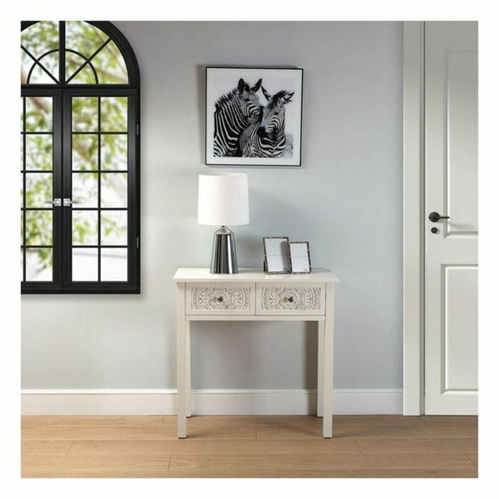 Schwarz-Weiß Zebra Kristall Bild. Tierdruck Kunst über einem weißen Konsolentisch.