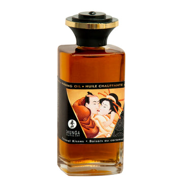 Shunga Caramel Kisses Öl: Erotisches Öl mit Pärchen-Motiv. Wärmendes Öl für sinnliche Momente.