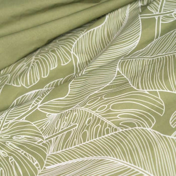 Grüner Bettdeckenbezug mit floralem Blätter Muster für Schlafzimmer Deko.