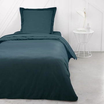 Smaragdgrünes Bettlaken-Set (90 x 190 cm) mit Kopfkissenbezug. Glatte, elegante Stoffqualität.