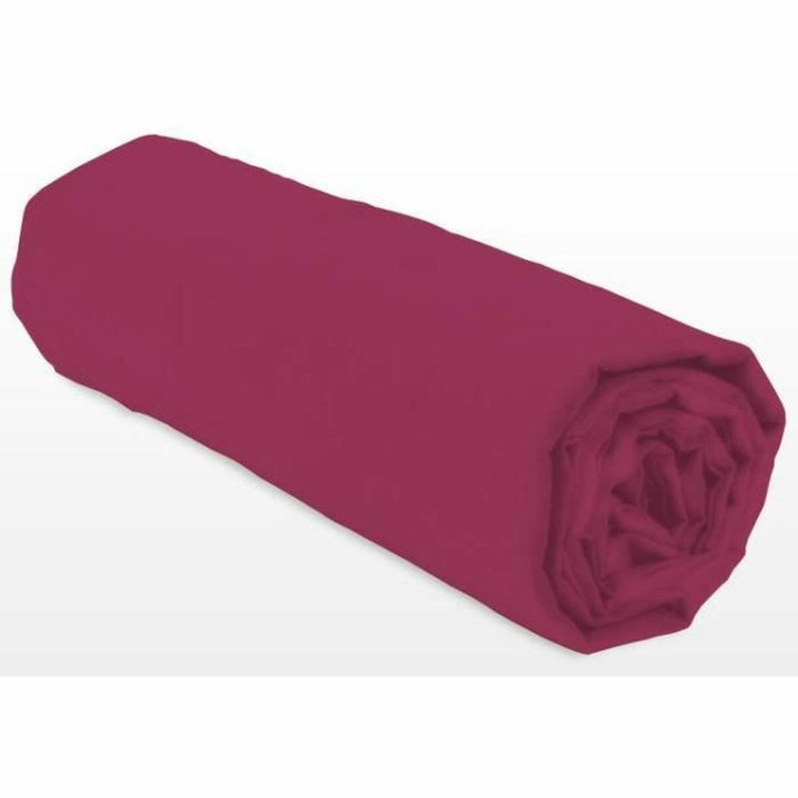 Gerolltes Spannbetttuch in Pink Rose Farbe. Textur des Spannbetttuchs ist sichtbar.