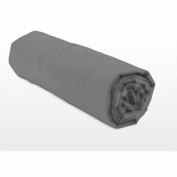 Gerolltes, anthrazitgraues Spannbetttuch mit weicher Textur und elastischen Kanten.