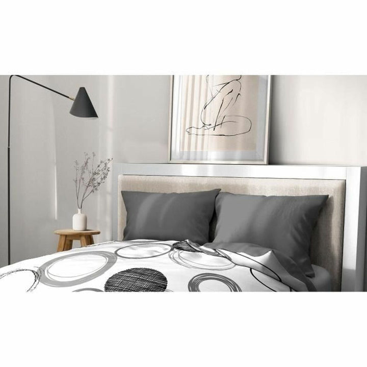Grauer HOME LINGE PASSION Kissenbezug mit modernem Kreis Muster auf Bettwäsche.