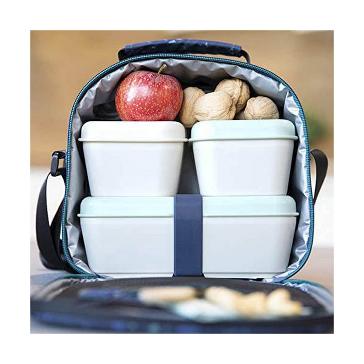 Grüne Milan Lunchbox mit Deckel, gefüllt mit Apfel - homely Family Shop