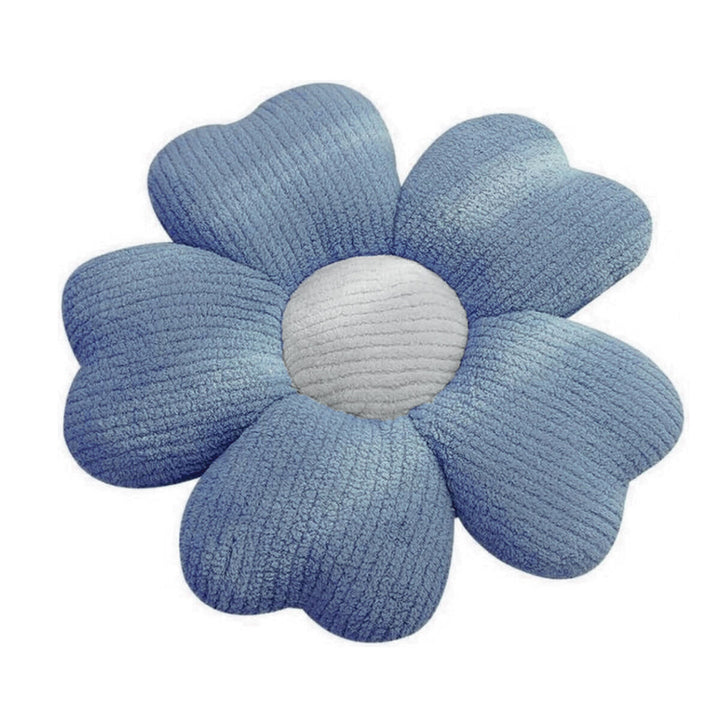 Blaues Blume Kissen mit weicher Textur und hellem Zentrum.