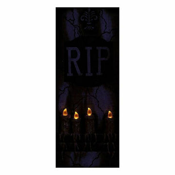 Leichter Halloween Grabstein mit RIP Inschrift und vier Kerzen für gruselige Deko.