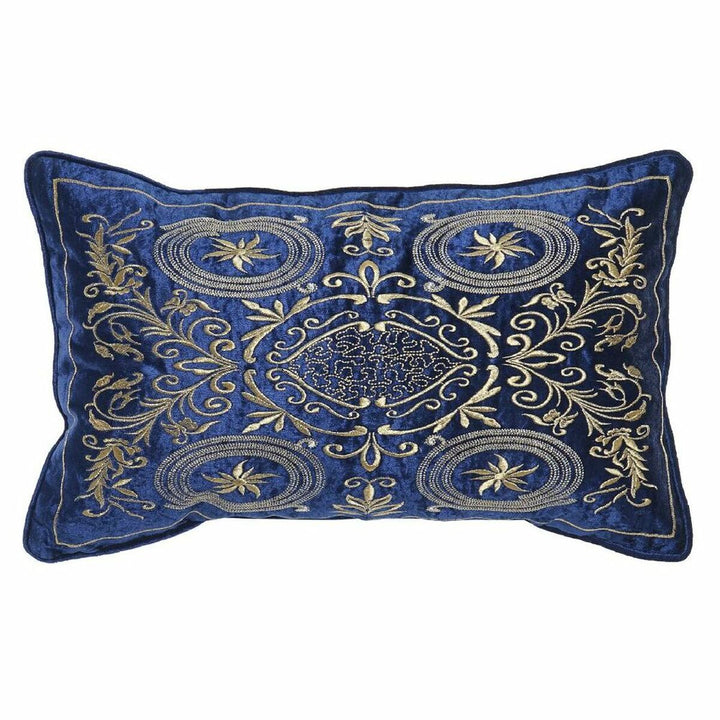Marineblaues Kissen mit goldfarbenen Stickereien und floralen Ornamenten.