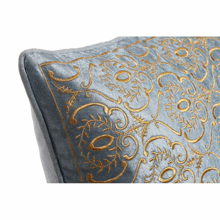 Blaues Kissen mit goldfarbener Stickerei. Dekoratives Design mit floralen Mustern.