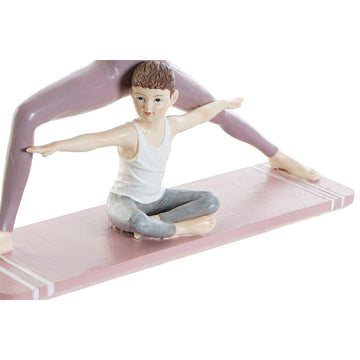 Rosa Deko-Figur im Scandi-Stil: Kind macht Yoga-Übungen. Entspannende Dekoration.