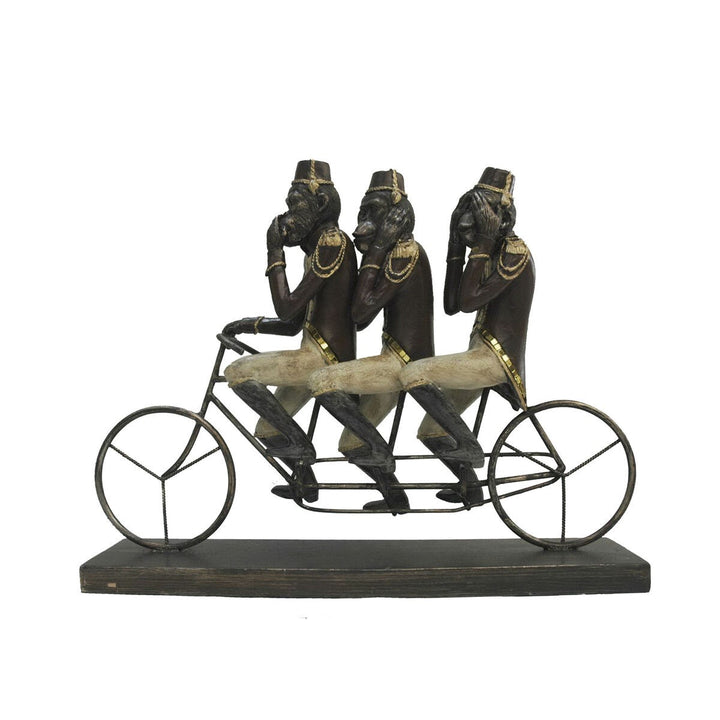 Schwarze und goldene Deko-Figur: Affen auf Dreirad aus Metall und Harz im Kolonialstil.
