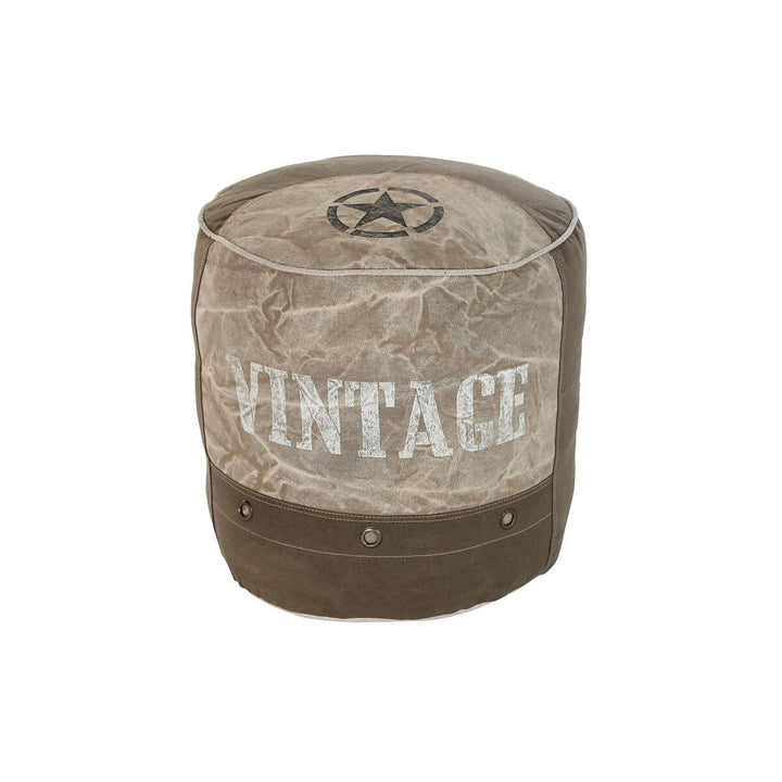 Graues DKD Home Decor Bodenkissen mit Stern, Aluminiumdetails und Vintage-Design.