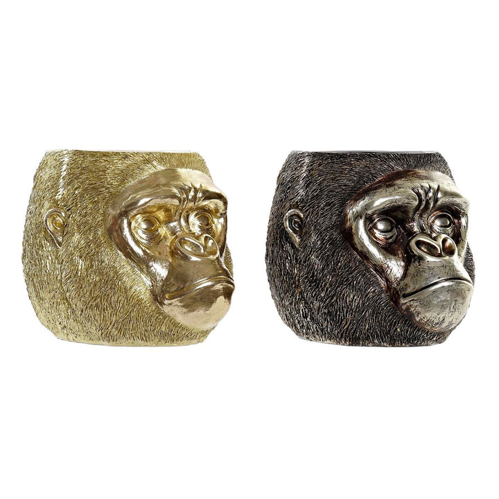 Zwei Deko-Figuren: Goldener und silberfarbener Gorilla im Kolonialstil.