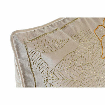 Nahaufnahme des goldenen Dekokissens mit Blumenmuster-Stickerei.