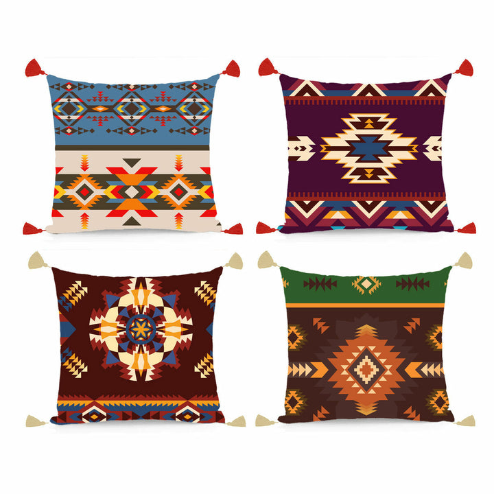 Bunte DKD Home Decor Kissen im Ikat-Design mit geometrischen Mustern und Quasten.