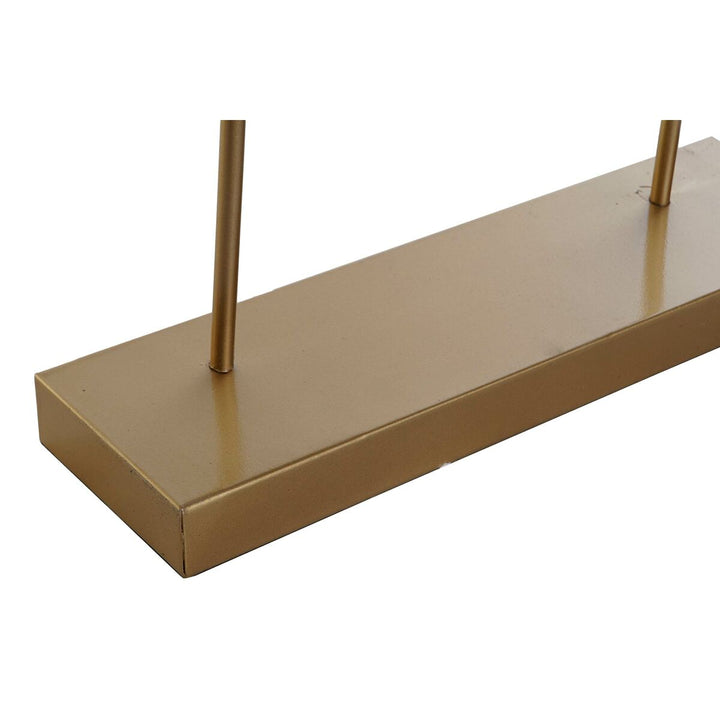 Nahaufnahme der goldenen Deko-Figur von DKD Home Decor im modernen, abstrakten Design.