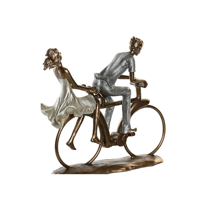 Deko-Figur eines Paares auf Fahrrad in Gold, Weiß und Silber. Elegante Dekoration.