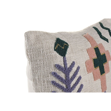 Nahaufnahme: Dekokissen mit bunten, gestickten Blumen und geometrischen Mustern.