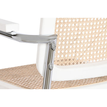Nahaufnahme: Armlehnstuhl mit Rattan und silbernen Details - Homely Family Shop