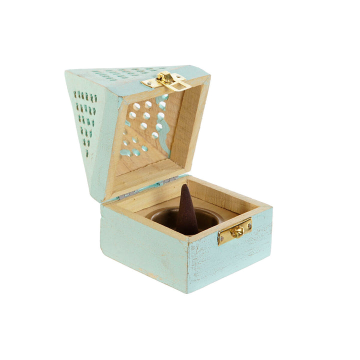 Offene, hellblaue DKD Home Decor Halterung mit braunem Weihrauchkegel.