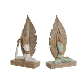 Weiße und grüne Deko-Figuren von ESPRIT Home im Scandi-Stil mit Yoga-Motiv.