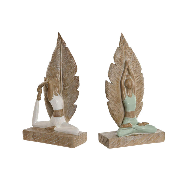 Weiße und grüne Deko-Figuren von ESPRIT Home im Scandi-Stil mit Yoga-Motiv.