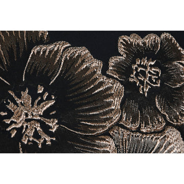 Schwarzes ESPRIT Home Kissen mit goldenem Blumenmuster Detail.