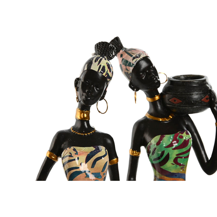 Bunte Deko-Figuren im Afrika-Stil. Afrikanerin mit traditioneller Kleidung und Schmuck als Dekoration.
