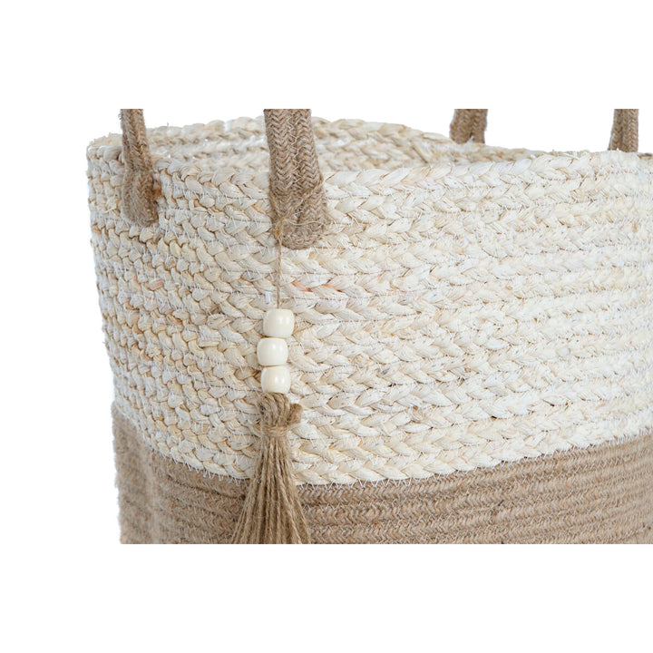 Nahaufnahme: Moderner Esprit Home Korb aus Jute mit hellem Braunton und dekorativer Quaste.