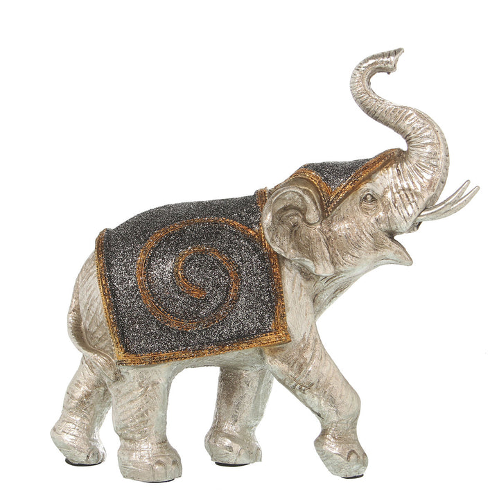 Silberfarbene Deko-Figur Elefant mit glitzernder Decke. Elegante Wohnaccessoires aus Kunststoff.
