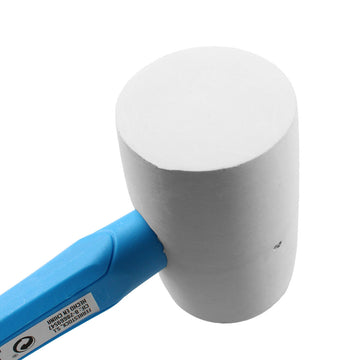 Weißer Gummihammer Ferrestock mit blauem Griff, ideal für schonendes Hämmern.