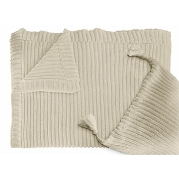 Beige Tejidos Reina Kissenbezug 50x70 cm mit Rippstrick und dekorativen Quasten.