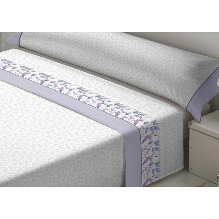 Violettes Dulceida Bettwäsche-Set für Doppelmatratze mit floralem Muster.
