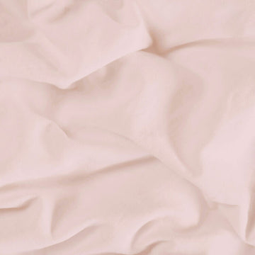 Nahaufnahme des nude Happy Home Oberlaken Double. Weiche Textur mit subtilen Falten.