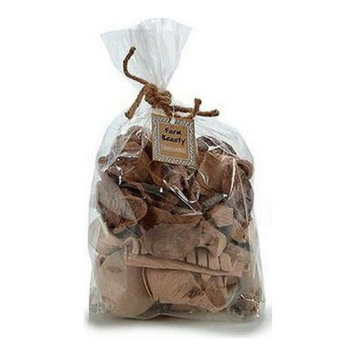 Braune Deko-Blumen in einer durchsichtigen Tasche. Potpourri mit 'Farm Beauty' Etikett.