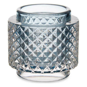 Blaue Kerzenschale aus Glas mit geometrischem Muster für stimmungsvolles Licht.