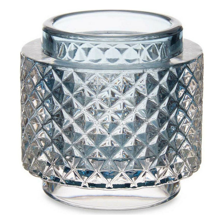 Blaue Kerzenschale aus Glas mit geometrischem Muster für stimmungsvolles Licht.