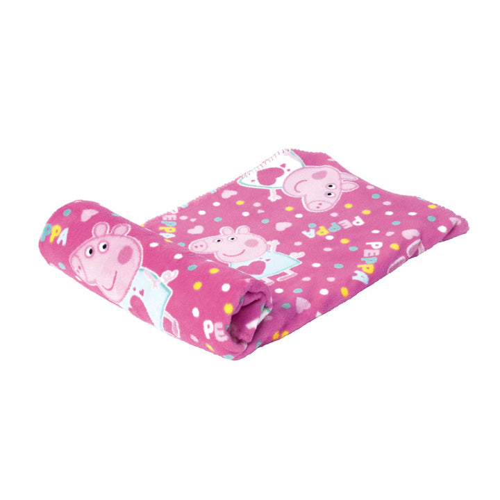 Rosa Peppa Pig Decke mit bunten Punkten und Peppa Pig Motiven.