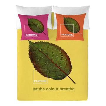 Gelber Bettdeckenbezug Nature mit Blattdesign und farbigen Kissenbezügen.