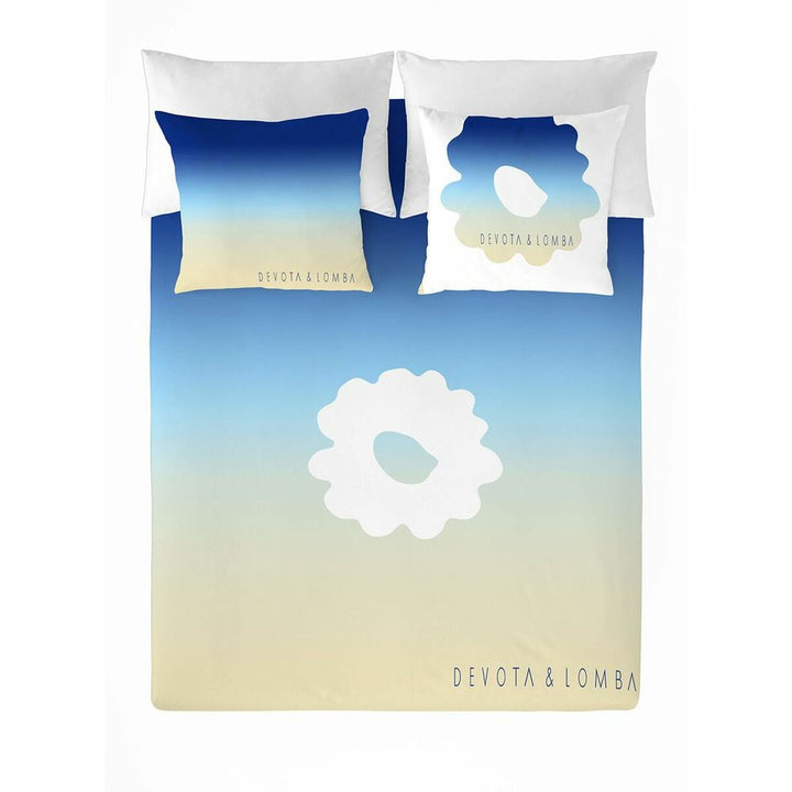 Arena Devota & Lomba Bettwäsche-Set mit blau-beige Farbverlauf und floralem Design.