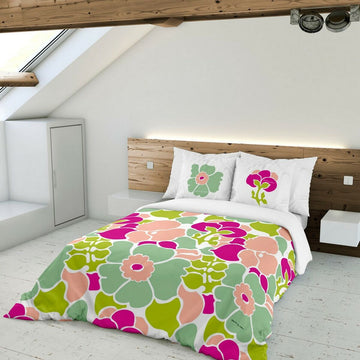 Bettdeckenbezug Anemona Devota & Lomba mit bunten Blumenmuster und passenden Kissenbezügen.