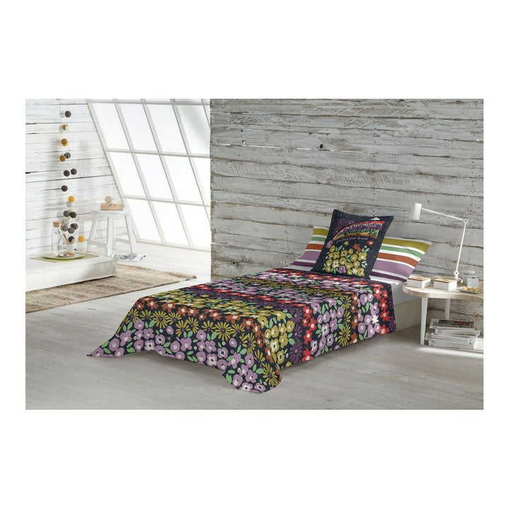 Bettwäsche-Set Cool Kids Follow mit Blumenmuster. Einzelmatratze mit farbenfroher Bettwäsche und Kissen.