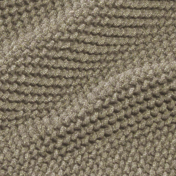 Nahaufnahme: Restaurierte Sofaskins Ohrensesselhusse mit gewebter Textur.