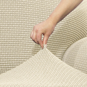 Beiger Sofaskins Chaiselongue Bezug mit Texturmuster für langen Arm rechts.
