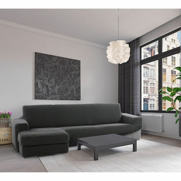 Dunkelgrauer Sofaskins Chaiselongue Bezug mit kurzem Arm links im Wohnzimmer.