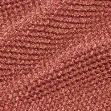 Nahaufnahme: Rotbraune Sesselhusse mit Strickmuster. Restaurierte Sofaskins Textur.