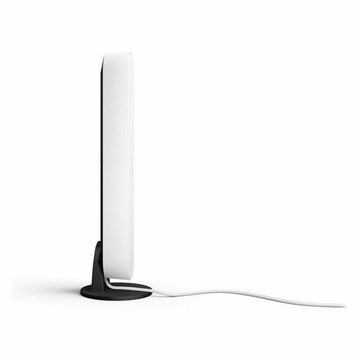Weiße Philips Play Tischlampe mit schlankem, modernem Kunststoff Design und schwarzem Fuß.