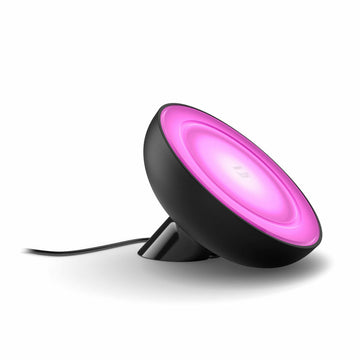 Philips Bloom Tischlampe, schwarz, mit sanftem rosa Licht für stimmungsvolle Atmosphäre.