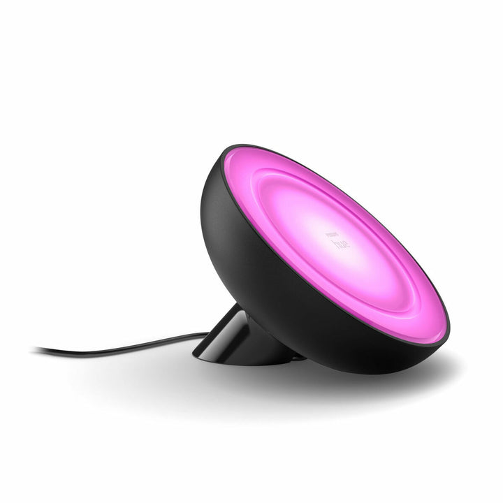 Philips Bloom Tischlampe, schwarz, mit sanftem rosa Licht für stimmungsvolle Atmosphäre.