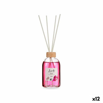 Parfümierte Stäbe Orchidee Duftdiffusor mit Holzstäbchen und rosa Flüssigkeit in Glasflasche.