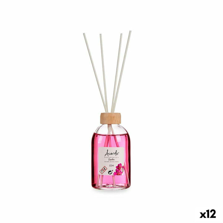 Parfümierte Stäbe Orchidee Duftdiffusor mit Holzstäbchen und rosa Flüssigkeit in Glasflasche.